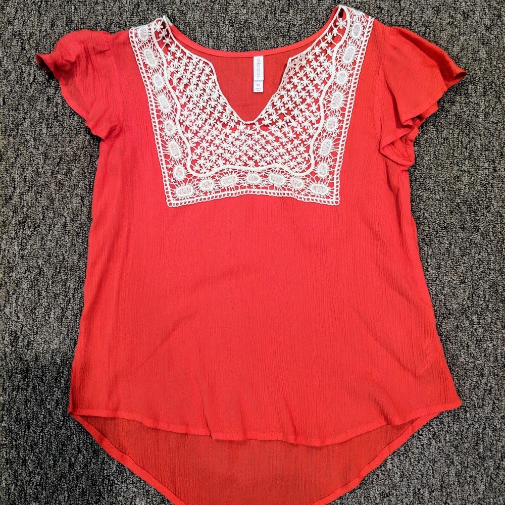 Salmon colored blouse wirh lace neckline